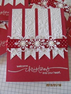 some red and white cards with snowflakes on them