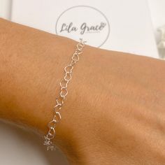 "Super cute sterling silver bracelet made from a heart link chain. Perfect as a gift or treat yourself, the bracelet is adjustable in size, choose your maximum size and then when worn make it a smaller fit by attaching the clasp to any link on the bracelet. Optional jewellery box, perfect if buying as a gift. WHAT YOU GET Bracelet Jewellery Card and Resealable Clear Bag Optional Jewellery Box MEASUREMENTS Each heart link is approx 5mm in size SIZE ONE - max size is 6\" SIZE TWO - max size is 7\" Womens Friendship, Friendship Christmas Gifts, Cute Jewellery, Jewellery Card, Clear Bag, Jewelry Card, Cute Bracelets, Sterling Silver Heart, Heart Bracelet