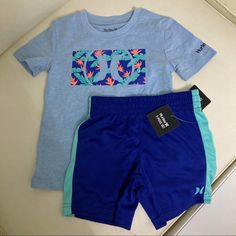 New 2 Pieces Included Blue Cotton Sporty Sets, Sporty Blue Cotton Sets, Sporty Blue T-shirt For Playwear, Light Blue Casual Sets For Playwear, Playful Blue Short Sets, Blue Sporty Short Sleeve Sets, Blue Short Sleeve Sporty Sets, Casual Blue Playwear Sets, Blue Short Playwear Sets