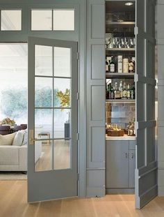 an open door leading into a living room