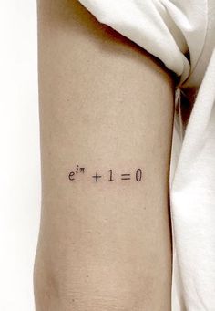 a woman with a tattoo on her arm has the word'o'written in cursive writing