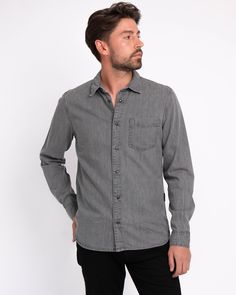 Amsterdam Heritage introduces the Flagler denim shirt for its menswear collection. Featuring a front pocket and snap button closure, the long-sleeved shirt is made from pure cotton, creating a lightweight and comfortable feel for the wearer. Adorned with our brand's logo, presented subtly in the back and side stitching, the Flagler is the ultimate classic denim shirt for every occasion. Never going out of style nor going out of season, style it with a blazer for a semi-casual look or match it wi Washed Black Cotton Shirt With Pockets, Washed Black Long Sleeve Denim Shirt, Casual Washed Black Button-up Shirt, Spring Urban Button-up Shirt, Washed Black Button-up Shirt With Pockets, Casual Washed Black Long Sleeve Shirt, Washed Black Cotton Shirt With Button Closure, Washed Black Cotton Button-up Shirt, Washed Black Long Sleeve Shirt With Button Closure