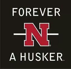 a black and red sign that says forever n a husker