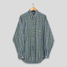 "Vintage Polo Ralph Lauren Checkered Green Flannel Large Ralph Lauren Plaid Checkered Shirt Polo Sport Multicolor Oxfords Buttondown Size L Please contact me for any questions about this clothing before buying. Size on tag : Size L (check measurements below) Measurement : Armpit to armpit : 22.5\" inches Back collar to hem (total length) : 32\" inches Weight : 0.30 kg Condition : Good Condition. No holes and no stains. Delivery / Postage :- DHL EXPRESS / EXPEDITED = 3-5 business day. **WE ARE US Green Button-up Flannel Shirt, Green Relaxed Fit Button-up Flannel Shirt, Casual Yarn-dyed Button-up Flannel Shirt, Green Cotton Button-up Flannel Shirt, Classic Yarn-dyed Button-up Shirt, Preppy Green Shirt With Button Closure, Classic Green Button-up Flannel Shirt, Classic Green Collared Flannel Shirt, Preppy Plaid Button-up Shirt