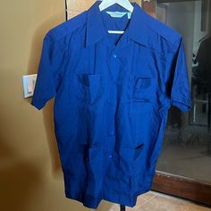 Vintage Supreme Button Shirt Permanent Press Short Sleeve Cotton Blend Size 1x Nwot (Cardboard Still Under Collar) Navy Blue F294-6 Navy Button-up Shirt With Pockets, Navy Button-up Tops With Pockets, Blue Work Shirt With Pockets, Blue Shirt With Pockets And Lapel Collar, Blue Workwear Shirt With Pockets, Workwear Camp Shirt With Lapel Collar And Pockets, Workwear Camp Shirt With Pockets And Lapel Collar, Fitted Tops With Buttoned Pockets And Lapel Collar, Blue Collared Shirt With Welt Pockets