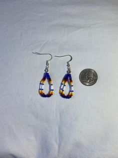 Handmade beaded small strand earrings. Measurement is 2''inch long. If a color is sold out just message us as we may have more available or if you have any other questions. Thanks for looking at our page. We also have some clearance items or raffles on are Facebook group pages. Come check us out at Cassy's Native Selling & Auctions or Cassy's Native Beadwork & Apparels. Beaded Chain Earrings With Round Beads For Gifts, Beaded Chain Earrings As Gift, Teardrop Earrings With Tiny Beads For Gift, Adjustable Beaded Chain Earrings As Gift, Handmade Casual Beaded Earrings, Casual Handmade Beaded Earrings, Adjustable Beaded Teardrop Earrings, Adjustable Large Beads Drop Earrings, Gift Beaded Earrings With Adjustable Chain