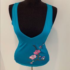 Beautiful Aqua Cd Viscose Blended Jersey Knit. Sleeveless Plunging V-Neckline. Front & Back Floral Print. Excellent Condition. Sexy Ventilated & Comfortable Dior Halter Top, Dior Butterfly Dress, Y2k Cotton Tank Top With Graphic Print, Vintage Dior Tank Top, Y2k Cotton Graphic Print Tank Top, Dior Top, Knit Jersey, Blue Green, Cd