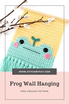 a knitted frog wall hanging with text overlay that reads, frog wall hanging free crochet pattern