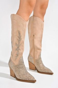 KNEE HIGH RHINESTONE WESTERN HEELED BOOT-Take your wardrobe to new heights with Anniston boots! Features a luxurious suede finish, sparkling rhinestone accents, and a sleek knee-high silhouette. These Western-inspired boots are the perfect choice for kicking off a fun-filled night-closed pointy toe-cowboy boots-zipper closure-lightly cushioned footbed-rubber outsole Style: WESTERN, BOOTS Embellishment: RHINESTONE Closure: ZIPPER Material Composition: Synthetic Leather Care Instructions: Hand Was Wide Calf Suede Boots For Winter, Winter Wide Calf Suede Boots, Western Suede Heeled Boots For Winter, Western Style Suede Heeled Boots For Winter, Fitted Western Suede Knee-high Boots, Western Beige Boots For Winter, Trendy Wide Calf Suede Boots, Western Style Suede Mid-calf Boots For Winter, Trendy Winter Heeled Boots With Snip Toe