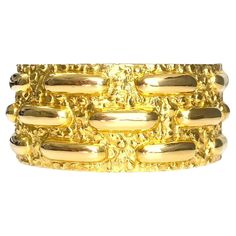 Introducing the David Webb Vintage Wide Bangle Cuff, a stunning piece crafted from 85 grams of 18k yellow gold. This exquisite cuff embodies timeless elegance and sophistication, showcasing David Webb's renowned craftsmanship and design expertise. The vintage-inspired wide bangle cuff exudes luxury, making a bold statement on any wrist. Whether worn alone or layered with other pieces, this David Webb creation is a true testament to the beauty and allure of fine jewelry craftsmanship. Large Bracelet, David Webb, The David, Vintage Stil, Timeless Elegance, Cuff Bracelets, Bangle Bracelets, Vintage Inspired, Jewelry Bracelets