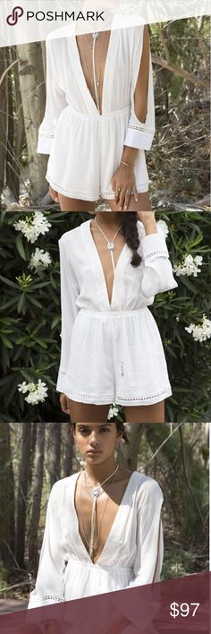 Somedays Lovin Nadin Lace Plunging Playsuit Cream Somedays Lovin Nadin Lace Plunging Playsuit Cream  Clean and classy, white is always in style. Update your summer wardrobe with this white plunging V neck romper. This pretty lace romper is light and airy keeping you cool all summer long. Dress this look up with a long chain necklace and heels for a night out or throw it on over your swimsuit for a pool party outfit. Even wear this boho romper at the office by adding a lacey tank underneath! Take White Lace Loungewear Dress, White Summer Playwear Dress, V-neck Lace Loungewear Dress, White Summer Playwear Set, White Long Sleeve Playwear Sets, Summer Party Outfit Night, Long Sleeve Playsuit, Pool Outfits, Summer Night Outfit