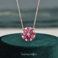 Marquise Ruby Necklace Lab Ruby Pendant Rose Gold Cluster Vintage Wedding Jewelry Art Deco Floral Inspired Women July Birthstone Bridal Gift * Order Service: Engraving/Rush Order/ Shipping Upgrade/ Size Upgrade/ 18K or Platinum upgrade https://www.etsy.com/listing/889751602/ Jewelry Details: * Center Stone: Lab Ruby, Marquise * Measures: About 1.5ct * Accents Stones: Moissanite or Natural Diamonds * about 0.29 carats * Metal Type: Solid 14k yellow gold, rose gold, white gold (Platinum, 10K or 18 Traditional Necklace For Wedding And Valentine's Day, Luxury Marquise Birthstone Jewelry, Ruby Necklaces For Wedding On Valentine's Day, Traditional Flower-shaped Wedding Necklaces, Flower Shaped Gemstone Necklace For Weddings, Ruby Flower Shaped Jewelry For Wedding, Flower Shaped Gemstone Necklaces For Wedding, Pink Ruby Bridal Necklace For Wedding, Elegant Ruby Necklace With Intricate Design