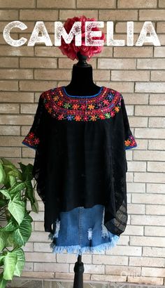 Guatemalan hand loomed and silk embroidered cover up. Perfect to use at the beach, pool or for daily wear over a tank top. Open sides and embroidery detail around neck and arms. Silk embroidery and cotton loomed thread. Made of 3 pieces of loomed fabric which are connected with thread. SIZE CHART: GUATEMALAN HUIPIL COVER UP WIDTH LENGTH ONE SIZE 37" 25" approximate measurements are in inches CARE:• Hand wash in cold water. • Lay flat to dry.• Do not iron. Please contact us if item is out of stoc Bohemian Embroidered Festival Poncho, Festival Poncho With Multicolor Floral Embroidery, Traditional Embroidered Floral Poncho, Traditional Floral Embroidered Poncho, Festival Colorful Floral Embroidered Poncho, Spring Festival Embroidered Poncho, Summer Beach Embroidered Top With Hem Detail, Floral Embroidered Tunic Top For Festival, Peasant Floral Embroidered Top For Beach