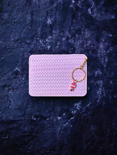 This product is a slim credit card holder made of faux leather, designed for women. It features a transparent ID window and a fish keychain. The wallet is available size XS. The wallet is perfect for carrying credit cards and other small items.  Once you place your order, your item will be carefully packaged and shipped via USPS, with a delivery time of typically 4 to 6 days, and free shipping option available. 🔥Approx Dimensions - 10.4cm x 6.6cm OR 4.0in x 2.5in 🔥Material - Faux Soft Vegan Le Rectangular Card Holder With Key Clip As Gift, Trendy Rectangular Card Holder As Gift, Trendy Card Holder With Interior Slots As Gift, Trendy Rectangular Card Holder Gift, Rectangular Card Holder With Key Clip For Gift, Trendy Card Holder With Interior Slots For Gift, Pink Card Holder With Interior Key Chain As Gift, Purple Wallet With Card Slots For Everyday Use, Purple Rectangular Wallet With Cell Phone Pocket