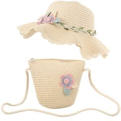 two straw hats with flowers on them