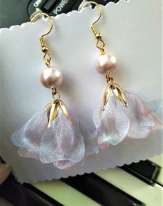 Do you want to surprise your best friend, wife, mother or a loved one? Or do you want to pamper yourself by wearing some unique earrings? These earrings in special shades will elegantly accessorize your outfit, giving it an extra touch of sophistication. I also invite you to choose other similar products from my store! Feminine Flower Earrings With Ear Wire For Gifts, Elegant Adjustable Handmade Flower Earrings, Flower Charm Drop Earrings For Party, Dangle Earrings With Flower Charm For Party, Flower Drop Earrings For Party, Drop Earrings With Flower Decoration For Party, Elegant Adjustable Flower Earrings, Party Flower Drop Earrings, Party Flower Charm Dangle Earrings