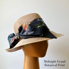 Our signature Middy Bow hat band is a removable hatband and bow combination that fits all of our ladies hat styles. The bow hatband is easily removable via a hidden closure and can be switched out for a different band in a matter of seconds, allowing you to mix and match hat shapes and bands to curate your own signature sun hat collection. Hidden Velcro dots hold the band securely in place on the hat. This listing is for one Middy Bow Hatband only. Hats shown below are the Meadow Hat, Tailored M