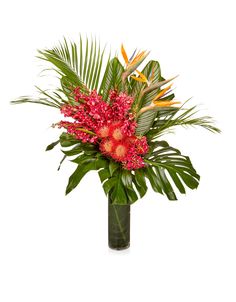 An arrangement of tropical varietals in vibrant reds and oranges designed in a chic glass hurricane vase Tropical Arrangements, Modern Glass Vases, Flower Words, Inspiration Photo, Orange Design, Flowers For You, Blooming Plants