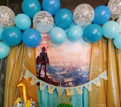 a birthday party with balloons and decorations