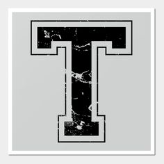 the letter t is made up of marble and black letters on a gray background with white border