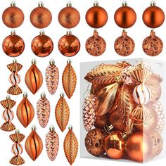 christmas ornaments and decorations are arranged on a white background, including oranges and golds