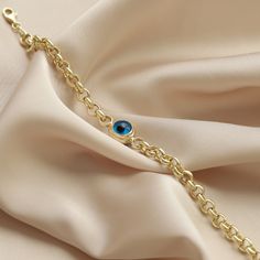 "Ⓜ14 K Gold Rolo Doc Evil Eye Bracelet Charm Chain Hoop Birthdays Gift For Women Luck Blue Gold Jewelry Design Handmade Dainty ⓂEvil Eye Bead Bracelet People have used Evil Eye Bead to avoid bad looks since long time. You can give a gift to the people you cared who dazzle with their beauty and want to be protected from the evil eye. This Evil Eye Bead Bracelet symbolizes grace and elegance. We designed this bracelet for you beautiful women who are always loved and do not compromise on their eleg Blue Tarnish-resistant Jewelry For Anniversary, Elegant Blue Jewelry With Gold Chain, Gold Rolo Chain Bracelet As Gift, Elegant Blue Chain Bracelet As Gift, Elegant Blue Chain Bracelet For Gift, Elegant Gold Charm Bracelet With Birthstone, Yellow Gold Birthstone Chain Bracelet, Elegant Blue Gold-plated Bracelets, Gold Charm Bracelet With Birthstone