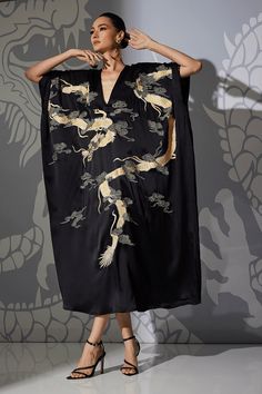 Natori Couture Lucky Dragon Embroidered Cocoon Silk Caftan Dress, 100% Silk, Women's, Black. Feel luxurious in the iconic dragon embroidered on silk. Length: 52" V-neckline Beading at the neckline and arm holes Beautiful hand embroidery for the "Year of the Dragon" Embroidery time: 1300 minutes Luxurious silk charmeuse 100% silk Dry clean only Natori Caftans and Robes. The Natori Company designs high-end women's fashion, including Intimates, Sleepwear, Lingerie, Ready-to-Wear, Home, Perfume, Tow Luxury Silk Kaftan With Embroidered Neckline, Luxury Embroidered Raw Silk Kaftan, Luxury Embroidered Silk Kaftan, Embroidered Silk Kaftan, Long Silk Embroidered Kimono, Cocoon Silk, Lucky Dragon, Caftan Dress, Silk Charmeuse