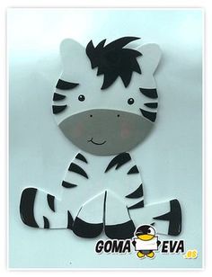 a paper cut out of a zebra with black and white stripes