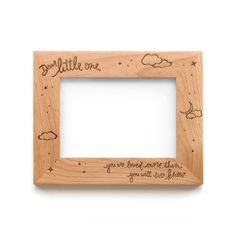 a wooden frame with writing on it