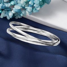 Ross-Simons - Italian Sterling Silver Rolling Bangle Bracelet. 7.5". The look of three in one easy-to-wear bracelet. Italian silversmiths interlock a trio of bangles to create this iconic rolling design. 3/8" wide. Slip-on, sterling silver rolling bangle bracelet. Three In One, Bangle Bracelet, Bangle Bracelets, To Create, Fine Jewelry, Bangles, Slip On, Bracelet, Sterling Silver