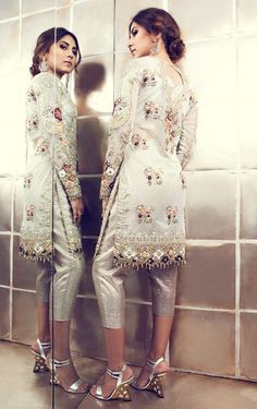 This Pakistani Designer suit is in white gorgette and all the embroidery is in Hand. Pant is in shimmer fabric. Please note if shimmer fabric is not available the we make raw silk white colour trouser. This suit can be customised in any color of your choice and pant lengths can also be altered. Dupatta of this suit is in white colour with embroidery butties in it. Bridal Short, Eastern Dresses, Shimmer Fabric, Pakistani Suit, Pakistani Designer Suits, Indian Bridal Lehenga, Pakistani Wedding Outfits, Indian Party Wear, Designer Suit