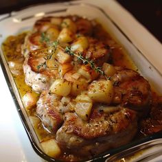 some meat and potatoes in a glass dish