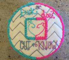 a cake that has been decorated with the words buck or doe out and know