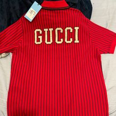 New! 100 Percent Authentic. Never Worn ! With Tags Designer Red Long Sleeve Tops, Designer Long Sleeve Red Top, Gucci Classic Short Sleeve Top, Gucci Cotton Long Sleeve Shirt, Classic Gucci Short Sleeve Top, Casual Gucci Collared Top, Red Gucci Cotton Top, Casual Gucci Collared Shirt, Gucci Cotton Polo Collar Top