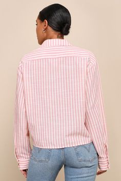 Cute and casual vibes come together to create the trendy look that is the Lulus Chic Marvel Pink and Ivory Striped Button-Up Long Sleeve Top! Breezy, cotton-blend woven fabric, with a white and pink striped pattern throughout, shapes a classy collared neckline and long sleeves with drop shoulders and button cuffs. An oversized, cropped bodice features a front patch pocket and functional button placket at the center. Fit: This garment fits true to size. Length: Size medium measures 22.50" from sh Striped Linen Top With Button Closure, Trendy Shirt With Buttoned Pockets, Chic Cotton Shirt With Roll-up Sleeves, Cotton Shirt For Fall Vacation, Summer Cotton Tops With Buttoned Pockets, Chic Spring Tops With Buttoned Pockets, Trendy Spring Shirt With Button Closure, White Blouse With Buttoned Pockets For Spring, Summer Cotton Blouse With Buttoned Pockets