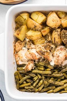 chicken, potatoes and green beans in a white casserole dish with text overlay