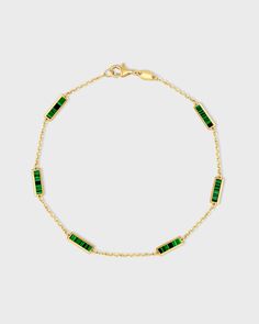 This delicate piece showcases a 14k gold setting for lasting luxury, featuring rectangular malachite inlays that adds a vibrant pop of color. Our Crystal Inlay Collection is made in Italy and finished in New York City. Malachite 14 Karat Gold 6.5 inches Handmade in NYC Elegant Green Jewelry With Box Chain, Luxury Green Rectangular Stone Jewelry, Luxury Emerald Jewelry With Rectangular Stone, Luxury Green Rectangular Bracelets, Luxury Green 14k Gold Bracelets, Elegant Green Oblong Jewelry, Elegant Green Rectangular Bracelet, Rectangular Gemstone Bracelet In Yellow Gold, Rectangular Yellow Gold Bracelet With Gemstone