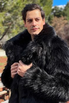 MENS DUTCH COAT WITH SNAP OFF HOOD ** This thick black faux fur is extinct. We have only a size Large available. We can make it in standard black shag. Standard shag will cost less. Message us. FEATURES High quality faux fur. ** Super Thick & Lux. Lined with super soft cuddle minky fabric. Collar and lapel. SNAP OFF HOOD Two outside side seam pockets to keep your hands warm. Two deep inside zipper pockets on the inside front coat sides. 6" Invisible zipper ID "secret" pocket on the inside left c Black Fur Coat, Chinchilla Fur, Secret Pocket, Black Wolf, Vest Coat, Black Faux Fur, Well Dressed Men, Minky Fabric, Comfy Cozy