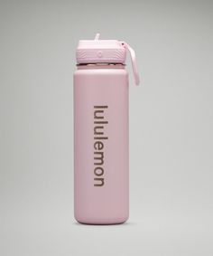 a pink insulated water bottle with the word unimen on it