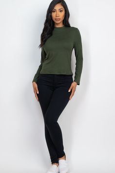 Mock neck solid long sleeve top from Capella Apparel Soft & light weight, high stretch jersey Style number: BT2662 Fabric Details: 92% Polyester, 8% Spandex Model is 5'8" and is wearing a Small Casual Stretch Elastane Turtleneck, High Neck Elastane Tops For Fall, Stretch Elastane Turtleneck Long Sleeve Top, Elastane Long Sleeve Top For Layering, Stretch Turtleneck Long Sleeve Top In Elastane, Fall Long Sleeve Elastane Turtleneck, Stretch Turtleneck Long Sleeve Top, Stretch Solid Color Turtleneck, Stretch Solid Color Elastane Turtleneck