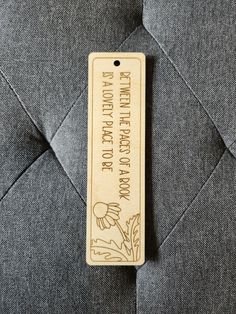 a wooden bookmark with the words, i love my mother and daughter on it