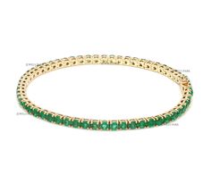 Real emerald tennis bracelet solid 14k gold | Natural 5CTW round emerald prong set tennis bracelet gold | Emerald tennis bracelet jewelspark Enjoy duty free shopping with faster turnaround times and a seamless experience! All our shipments are duty free and have door to door delivery! STONE DETAILS : ✦ Gemstone : Emerald ✦ Gemstone Type : Natural ✦ Gemstone Size : 2.50 MM ✦ Gemstone Shape : Round ✦ Gemstone Weight : 5.230 carats ✦ Gemstone Grade : AAA METAL DETAILS : ✦ Metal : 14K/18K Gold ✦ Met Green Round Tennis Bracelet With Prong Setting, Green Tennis Bracelet With Prong Setting, Emerald Tennis Bracelet, Tennis Bracelet Gold, Rainbow Sapphires, Bracelet Box, Rainbow Bracelet, Asscher Cut, Emerald Gemstone