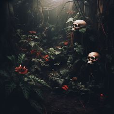 two skulls in the middle of a forest with red flowers and green leaves around them