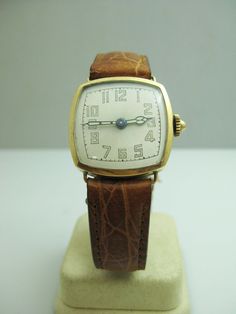 "For Sale: (1) b715 Unisex Vintage Swiss 14kt Yellow Gold Mechanical Wristwatch PLEASE READ ENTIRE DESCRIPTION BEFORE PURCHASING This is a vintage Swiss mechanical wristwatch. Simple dial. Crystal and dial are in good shape. Bezel has some small scratches. Would make a nice Birthday, Christmas, Father's Day or Valentine's Day present. Please see pictures for more details! Specifics: Swiss made Mechanical Case width: 27mm Lug width: 16mm Thickness: 8.255mm Band measures: 8 15/16\" Weight: 27.7g I Formal Yellow Gold Analog Watches And Jewelry, Formal Yellow Gold Analog Jewelry And Watches, Classic 14k Gold Chronometer Watch, Antique Yellow Gold Watch Bands For Formal Occasions, Antique Yellow Gold Analog Watch, Antique Analog Watch For Formal Occasions, Antique 14k Gold Watches For Formal Occasions, Antique Formal Analog Watch, Heirloom Chronometer Watch For Formal Occasions