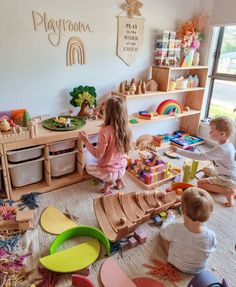 children playing with wooden toys in a playroom at the park house, which is open to let kids know what they are doing