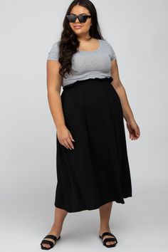 Details An ultra soft knit plus size midi skirt featuring an elastic waistband and side pockets. Content + Care 57% Polyester 38% Rayon 5% SpandexMachine Wash Cold, With Like Colors, No Bleach, Hang DryImport Size + Fit Length: 36"Measured From: 1XProduct Code: 73580 Plus Size Midi Skirt, Carbon Offset, Sale Promotion, Plus Size Skirts, Personal Marketing, Black Skirt, Soft Knits, Free Size, Blush Pink