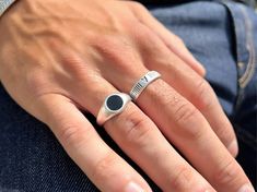 Two different silver rings for men in two unique designs. The first one has an enamel stone in black color and the second one is a silver band ring with lines and geometric shapes on it that fits perfectly to mens fingers and gives extra style. Both of them are slightly adjustable. Find them only at Christina Christi Store. DIMENSIONS - Mens Ring Diameter  US 10 1/4 - Slightly Adjustable. MATERIALS - Pewter. PROTECTION - Make sure that you do not stress or open and close your ring too often beca Modern Black Enamel Rings For Gifts, Modern Silver Signet Ring With Black Enamel, Modern Enamel Ring With Polished Finish For Gift, Black Minimalist Engraved Sterling Silver Ring, Silver Minimalist Enamel Ring For Anniversary, Silver Sterling Silver Enamel Promise Ring, Minimalist Silver Rings With Black Enamel, Silver Minimalist Rings With Black Enamel, Sterling Silver Enamel Ring With Polished Finish As Gift