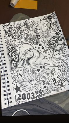 a notebook with some drawings on it