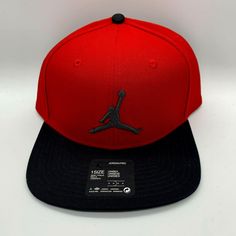 the air jordan hat is red and black