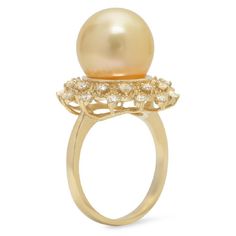 Splendid Natural South Sea Pearl and Diamond 14K Solid Yellow Gold Ring Suggested Replacement Value: Approx. $5,200.00 Stamped: 14K Total Natural Pearl Measures: Approx. 12mm Total Natural Round Diamonds Weight: Approx. 0.65 Carats (color G-H / Clarity SI1-Si2) Ring total weight: Approx. 7.5 grams Disclaimer: all weights, measurements and colors are approximate and may vary slightly from the listed dimensions or as seen in the image. All pictures are magnified to show the smallest of details. Pl Etsy Gold Ring, Sea Pearl, Natural Pearl, South Seas, Sea Pearls, South Sea Pearls, Pearl Diamond, Yellow Gold Ring, Natural Pearls